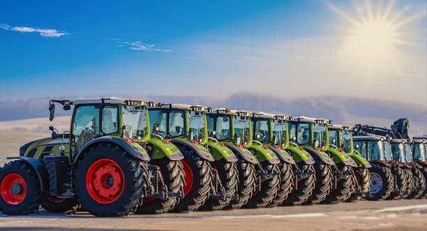 Exhibition / new tractors lined up next to each other in a row Exhibition / new tractors lined up next to each other in a row